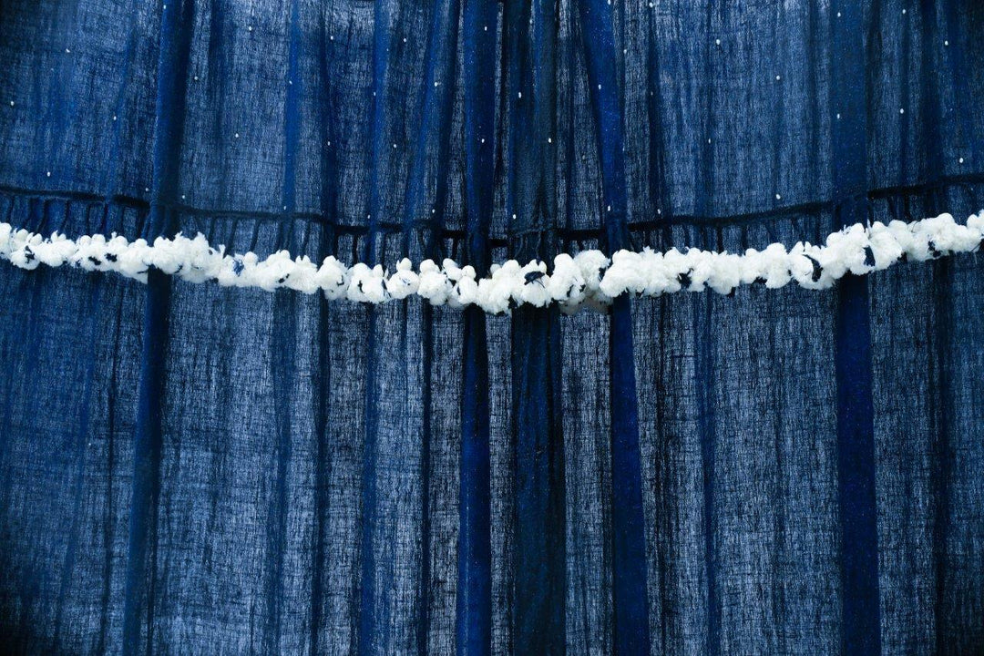 Indigo handwoven kala cotton curtains with white dots and tassels