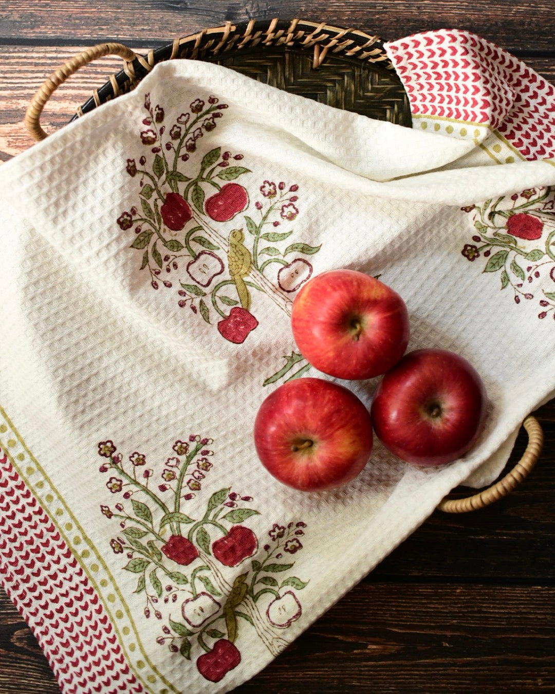 Apple orchard tea towel with apples on it