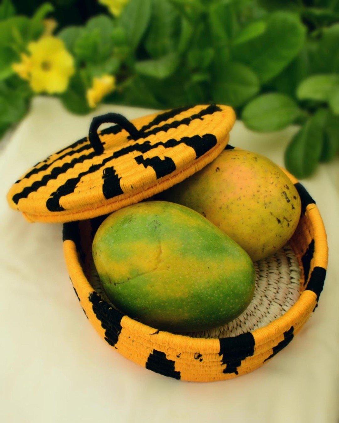 Tiger print Sabai grass lidded basket or box with mangoes