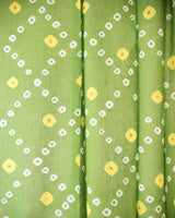 Details of green and yellow bandhani fabric